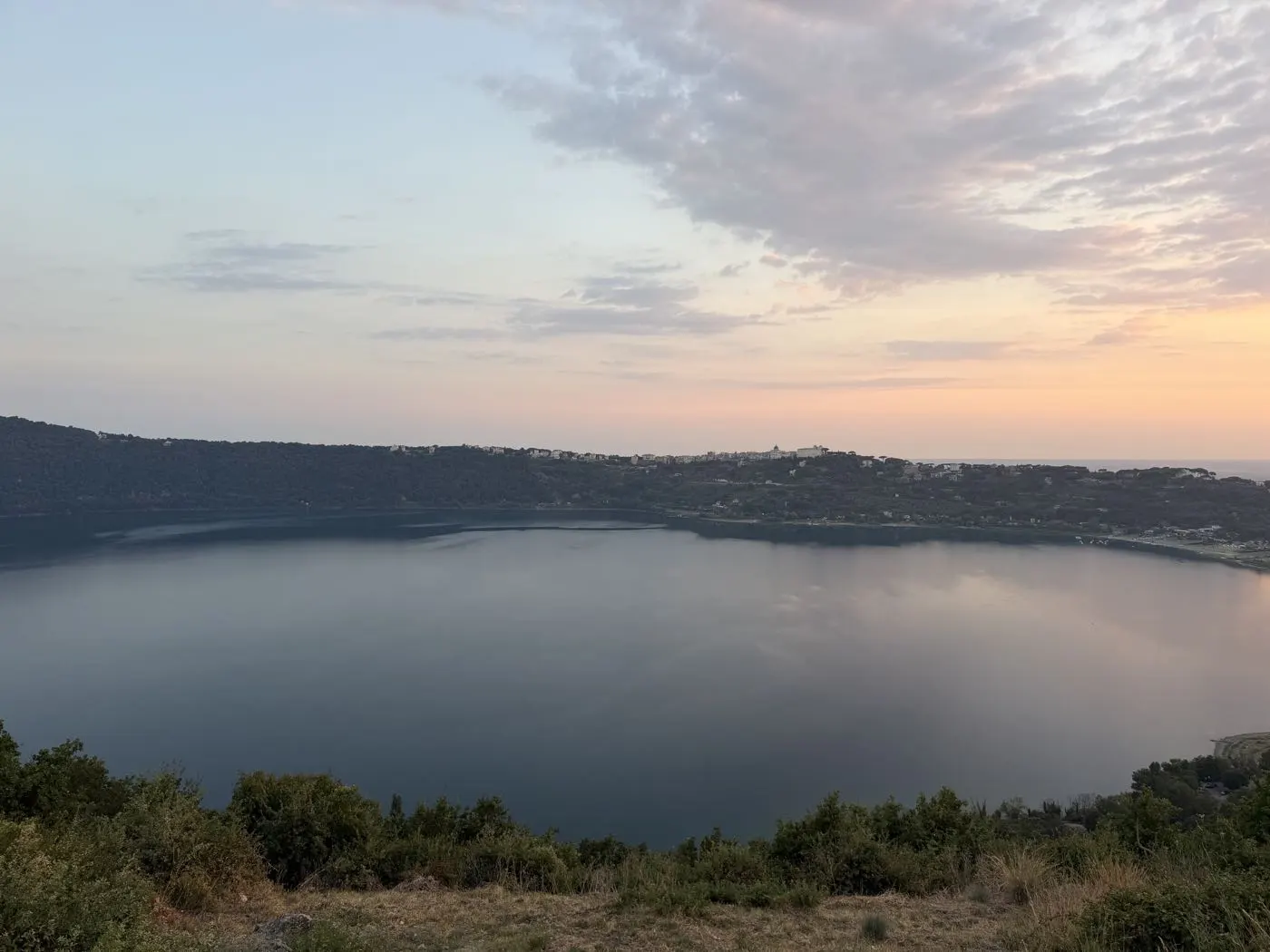 Lake Albano at dusk with Castel Gandolfo on the ridge